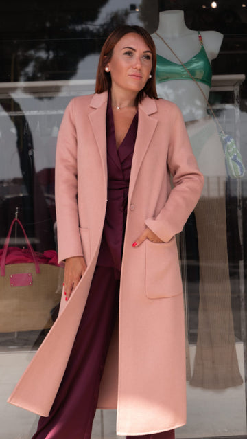 Cappotto lungo rosa cipria con tasche frontali